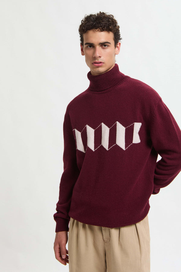 PULL À COL ROULÉ AVEC LOGO EN ACCORDÉON